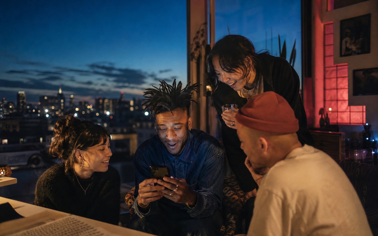 Friends sharing a lively moment together in a city studio